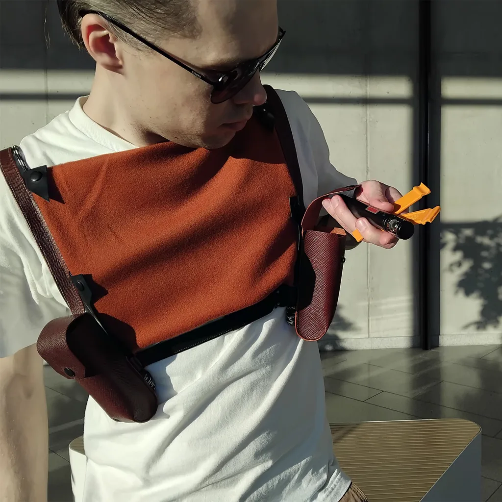 Cycling vest pocket holding mini pump and tire levers